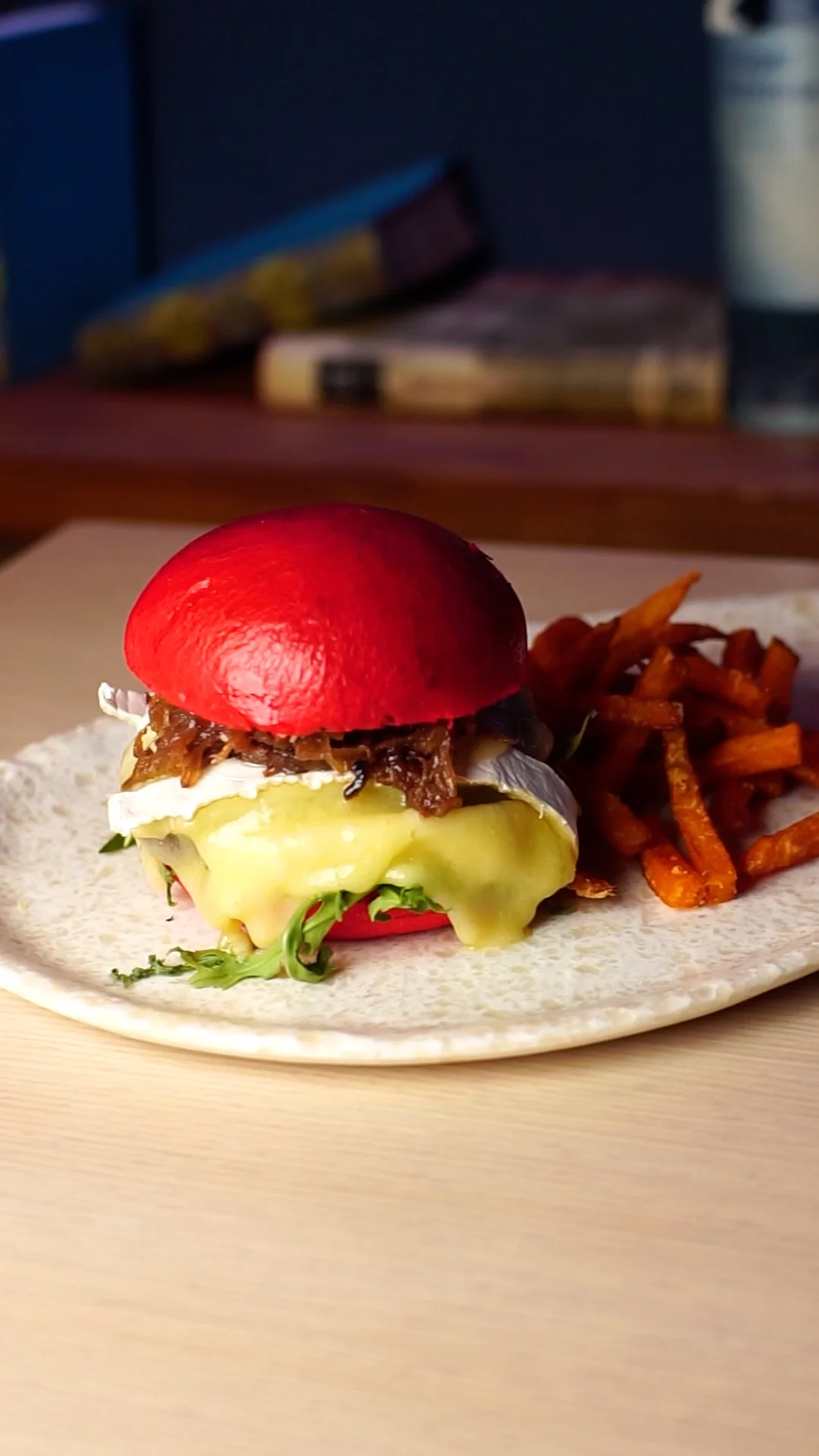 Mediterranean buffalo burger on red bread with Brie cheese, arugula and our bacon, onion and coffee confit (Served with sweet potato fries)