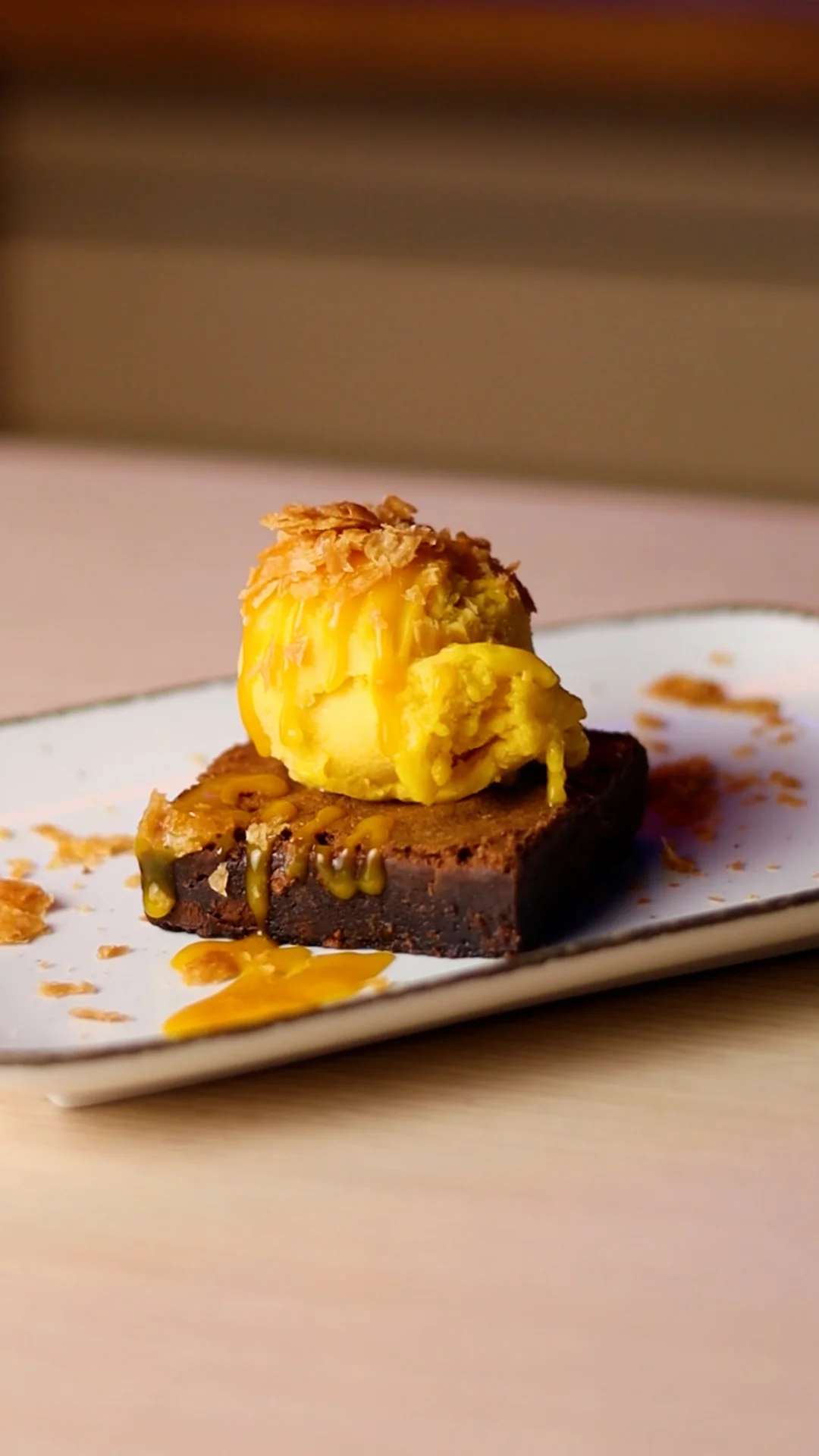 American Fudge Brownie with Mango Ice Cream and Exotic Fruit Coulis