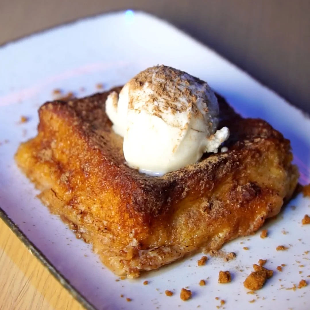 Caramelised Torrija with meringue milk ice cream and caramelised nut crumble